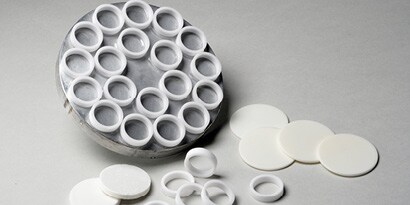 Ceramic rings bonded to a metal plate
