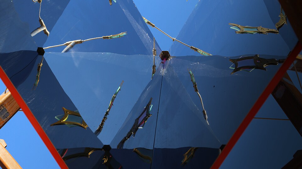 Video of a robot competing in a recycling contest during the FIRST Robotics competition in St. Louis