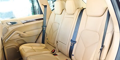 Image of car interior with tan leather seats
