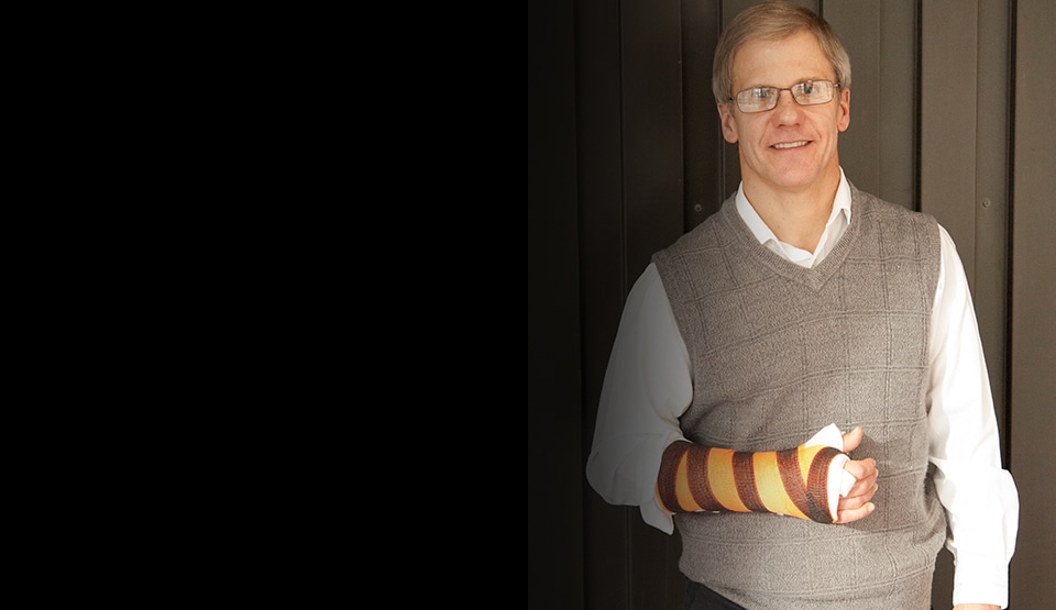 scientist Matt Scholz, wearing his invention, a 3M Scotchcast