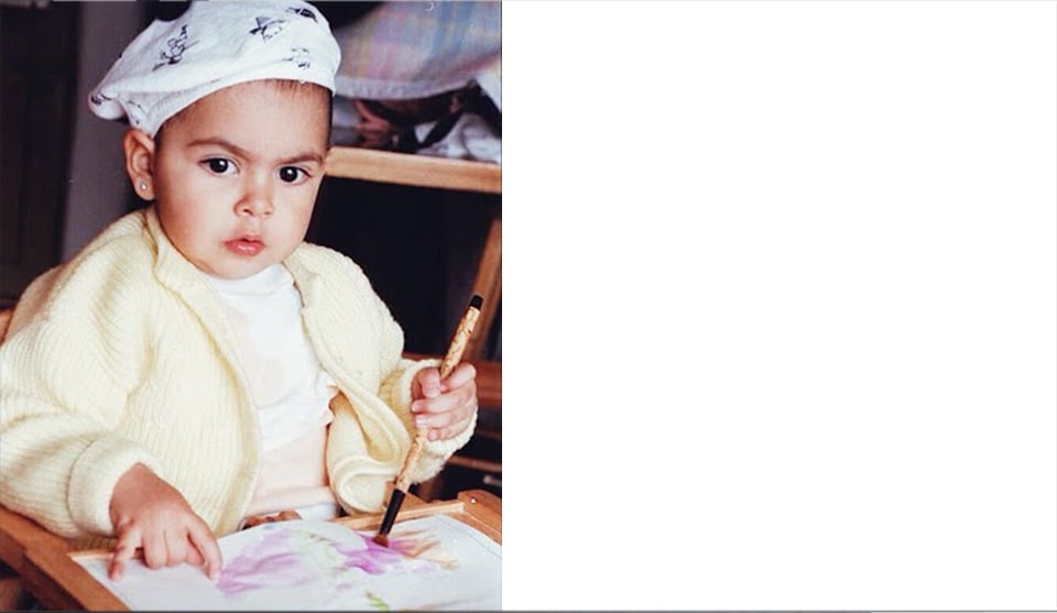 Young image of Lys Quintero making art.