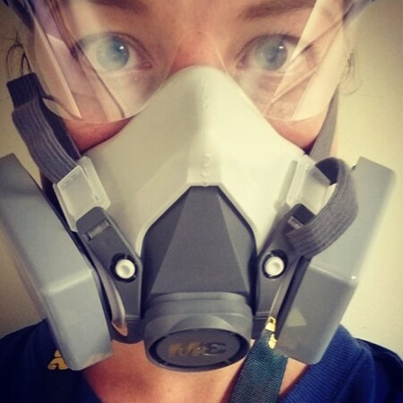 Nurse wearing a reusable respirator