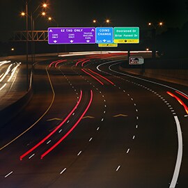 Diamond grade reflective signs on highway at night