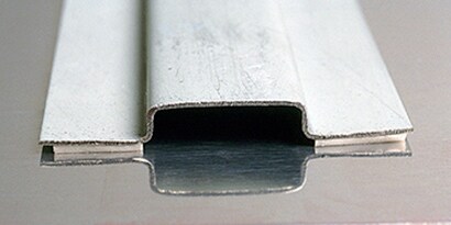 Metal substrates joined together with metal adhesive
