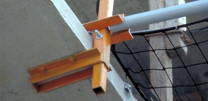 Image of netting system attached to poured concrete floor
