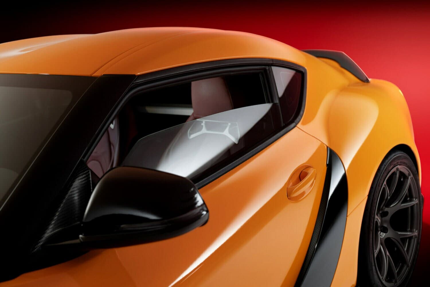 coche naranja con película de ventana 3M